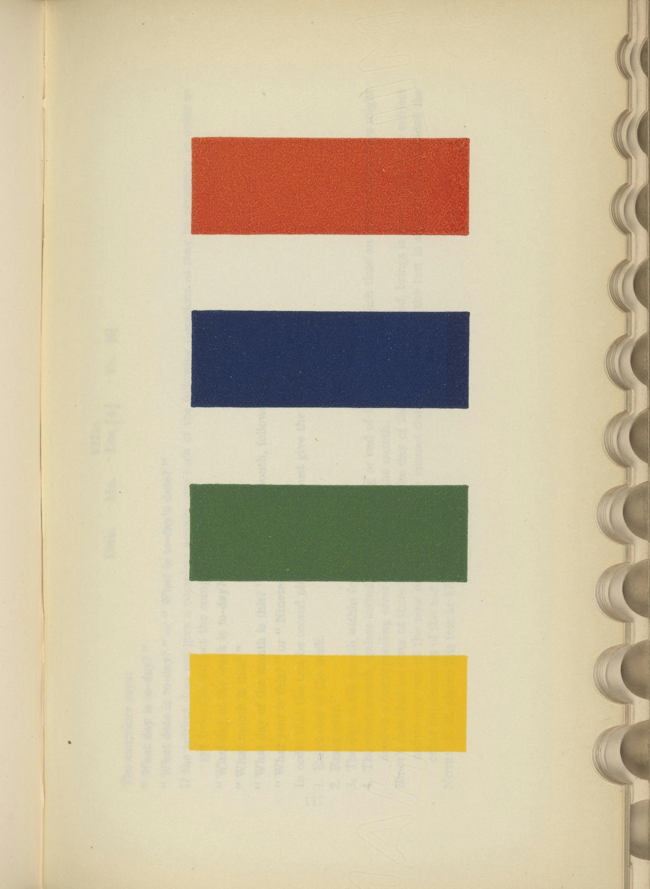 A page from a book showing four uniform blocks, each one a different colour.