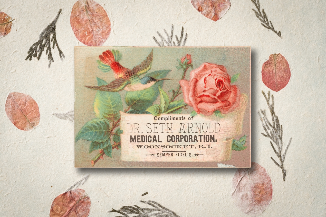 An image of a 19th-century medicine advertising card. The card shows large pink flowers being visited by a hummingbird with red, blue and green feathers. Behind the card is a background of pink petals and plant stems.