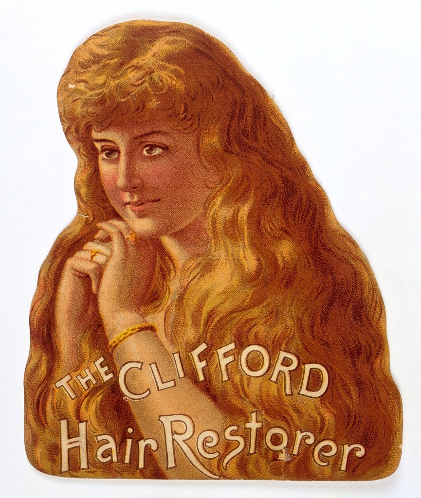 A die cut card showing the upper half of a smiling young woman with a profusion of golden hair and her hands raised to her chin.  Accompanying text reads 'The Clifford Hair Restorer'.