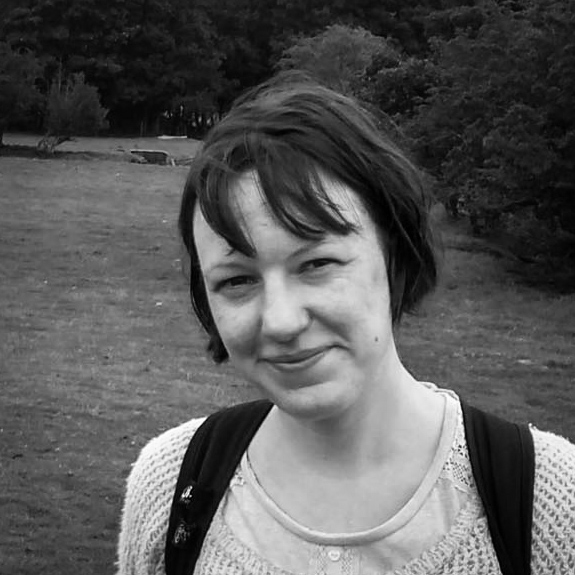 A black and white, head and shoulders photograph of Vicky Scott.