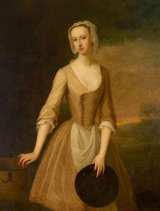 Painting in the Duchess of Queensberry dressed in very simple clothing to resemble a milkmaid. She is wearing a plain light-brown dress, a light apron, slight white frills at her neckline and cuffs and a simple white cap. 