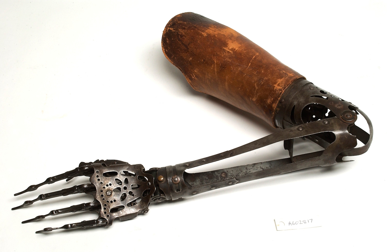 A prosthetic hand and forearm dating from 1890. It’s made from steel, with brass wrist mountings and a leather upper arm socket.