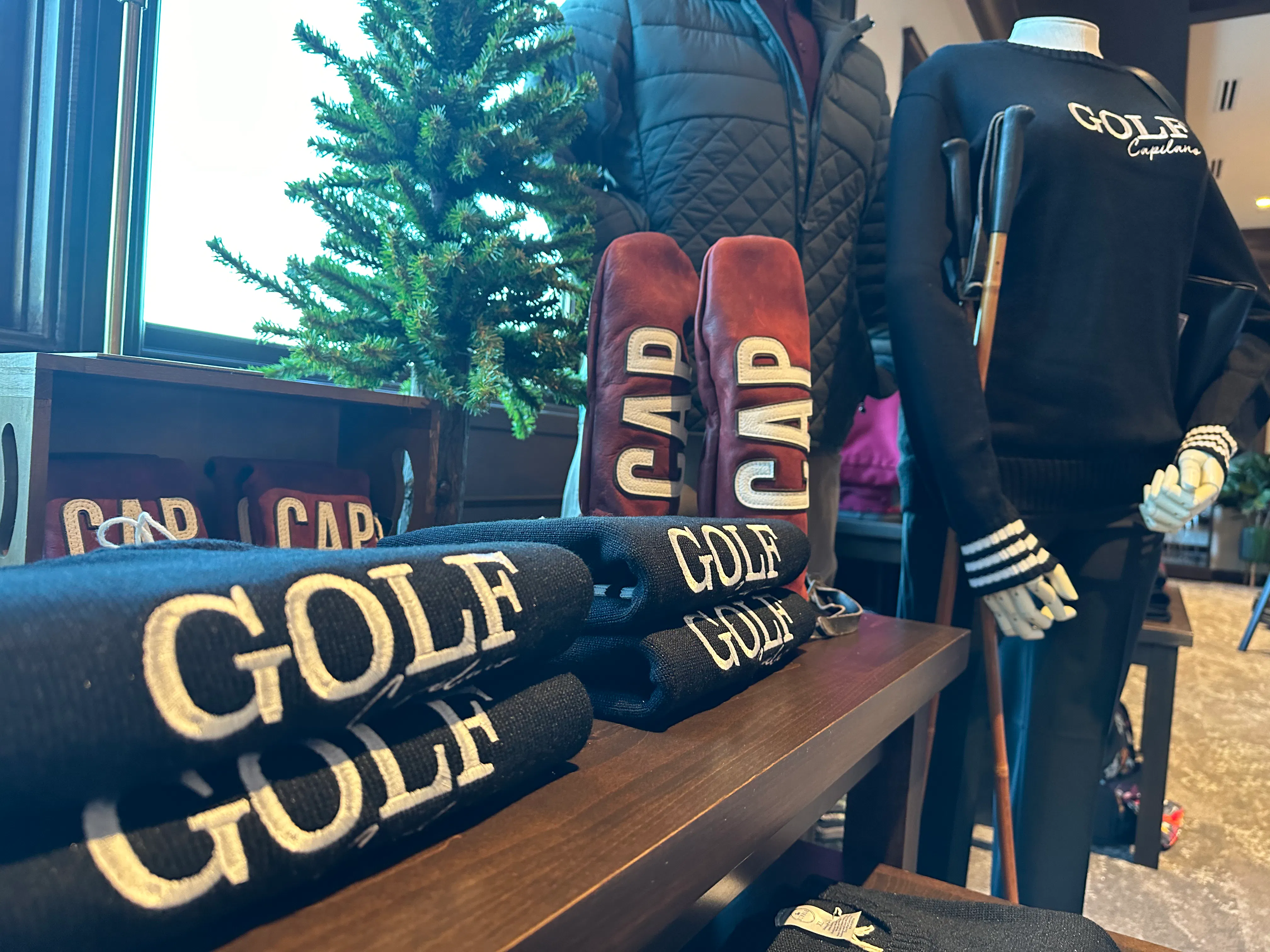 Capilano Golf and Country Club pro shop interior details, branded sweatshirts