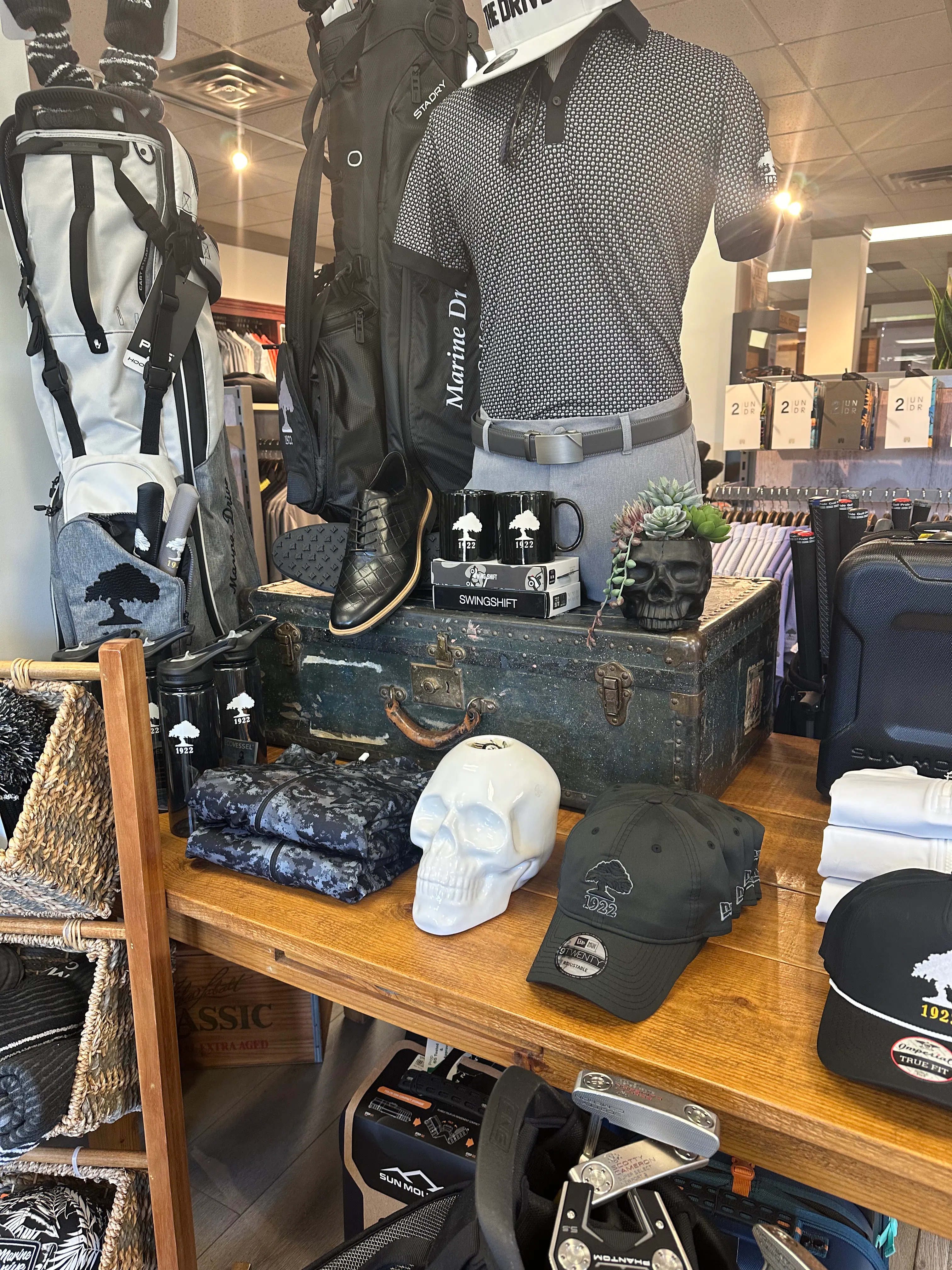 Marine Drive Golf Club pro shop retail layout showcasing curated golf merchandise