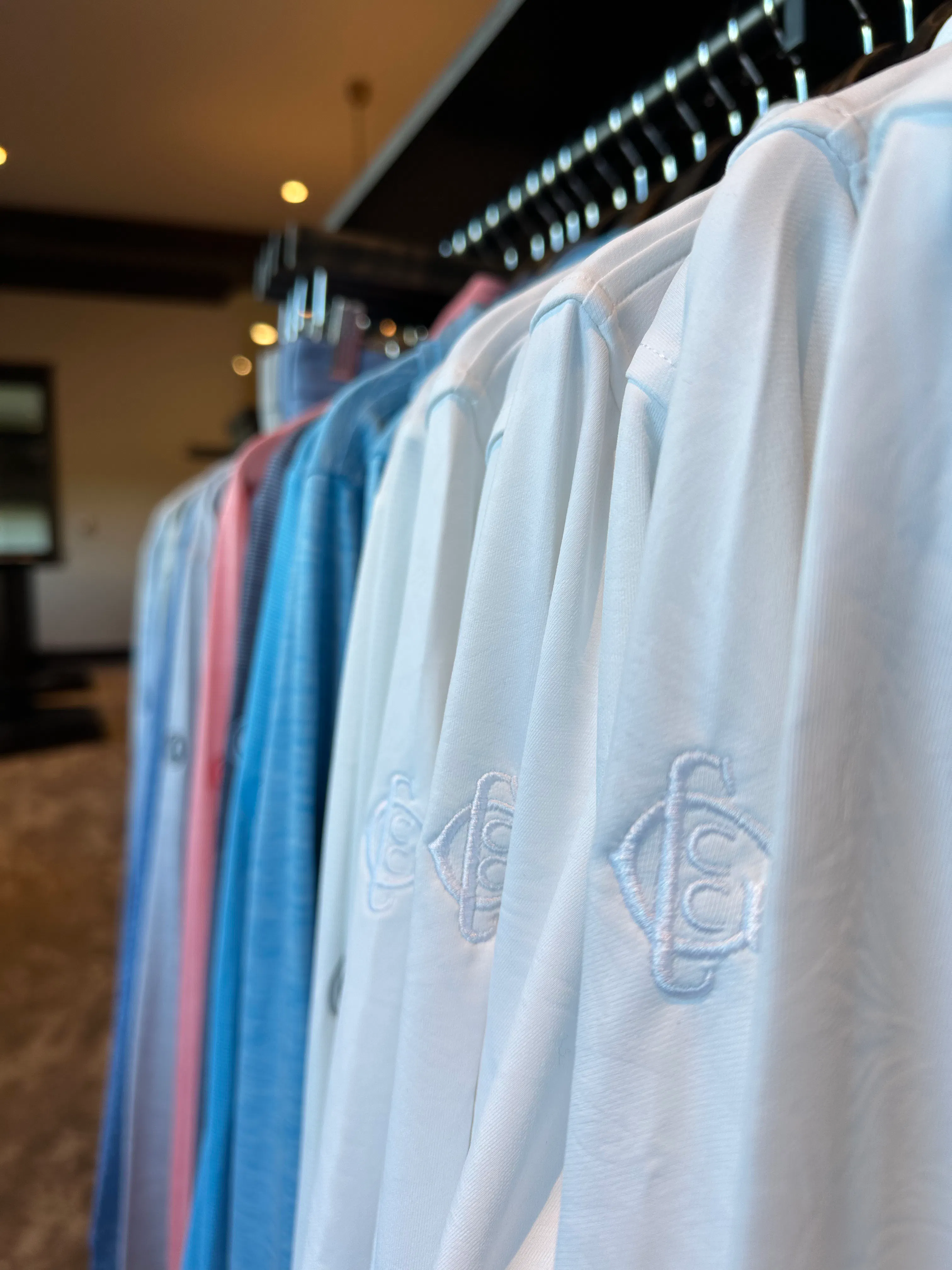 West Golf Group pro shop interior showcasing curated merchandise display