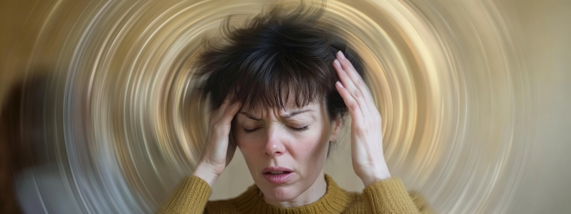 Frau mit Schwindel Migräne