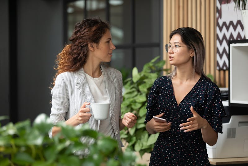 Two business women having a conversation