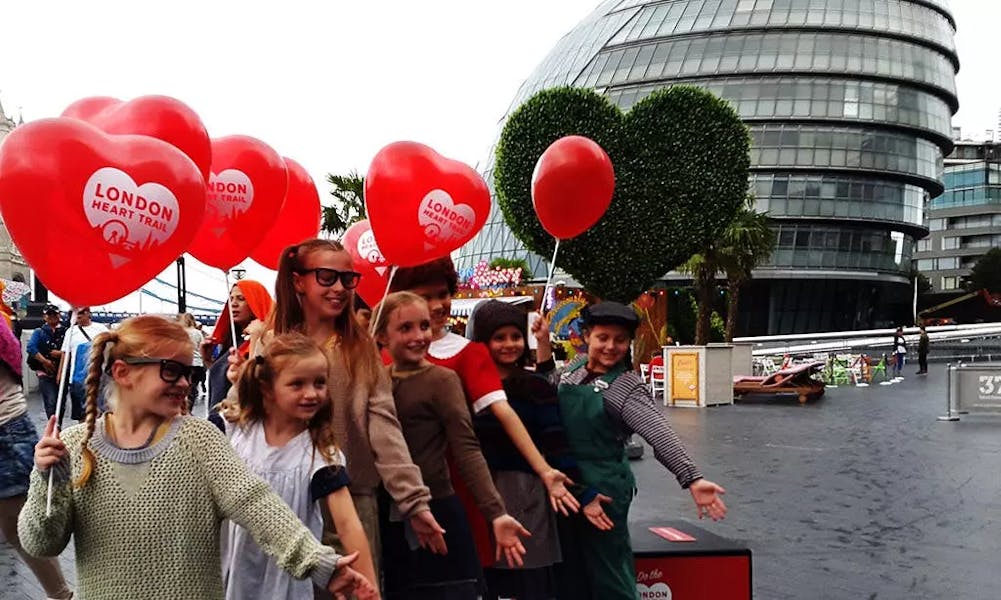 Chidren holding heart shaped balloons for for London Heart Trail