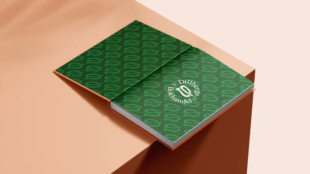 Dillbergs logotyp och mönster i en bok