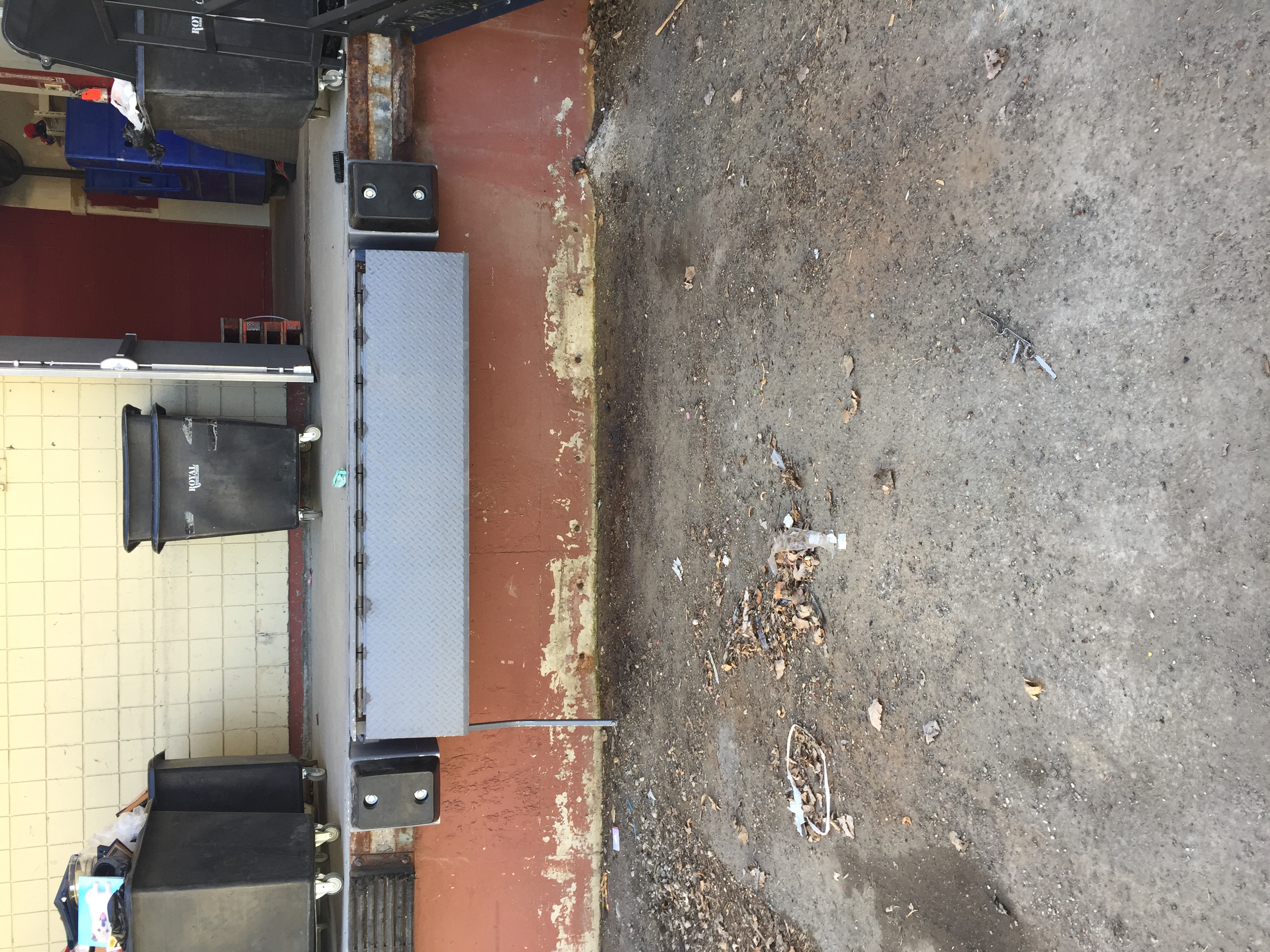 Installed edge of dock leveler