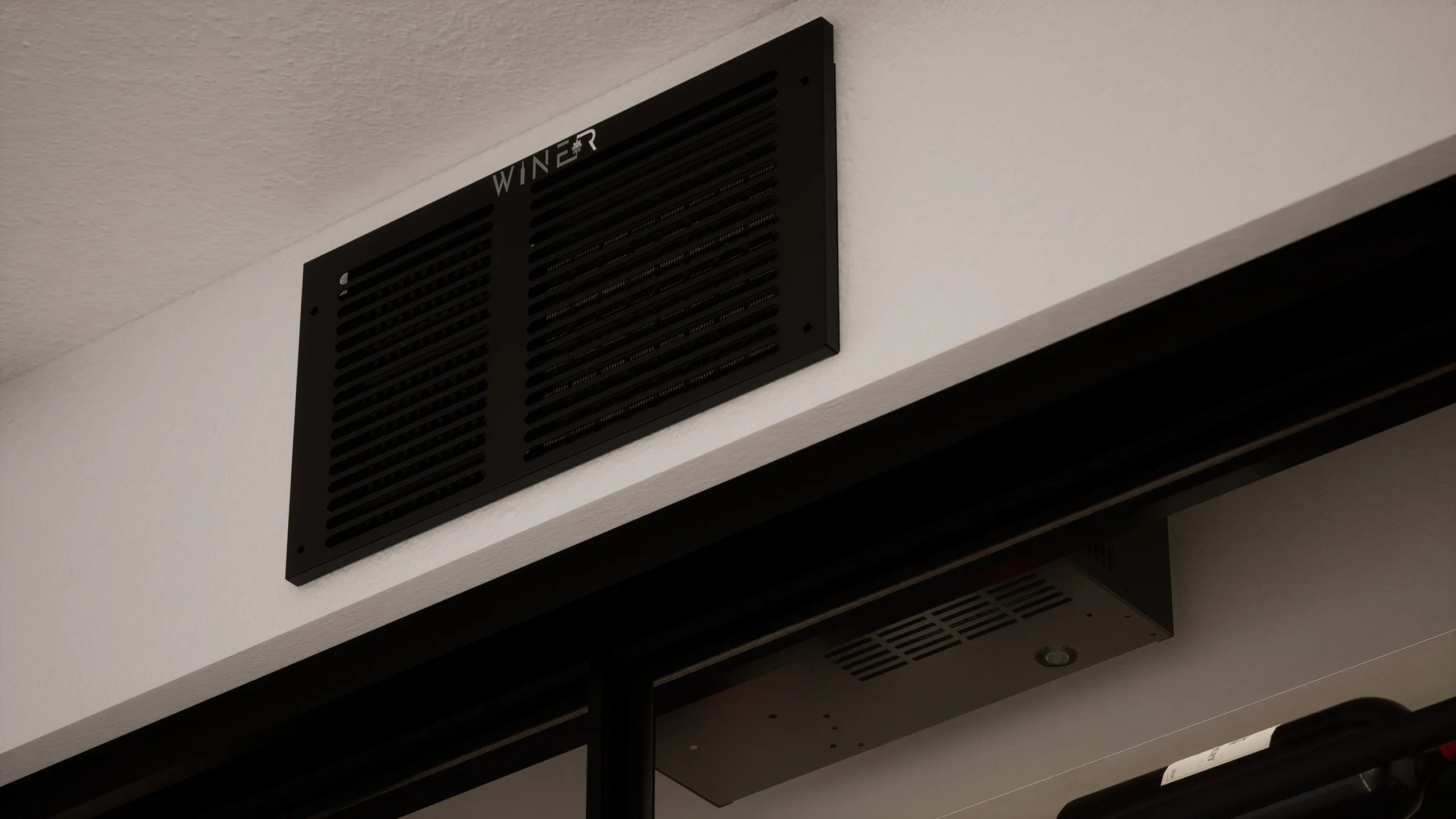 WR2500 unit installed through a wall, mounted face view from inside the cellar