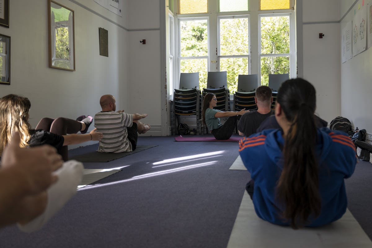 Wings Trust Community members morning yoga 