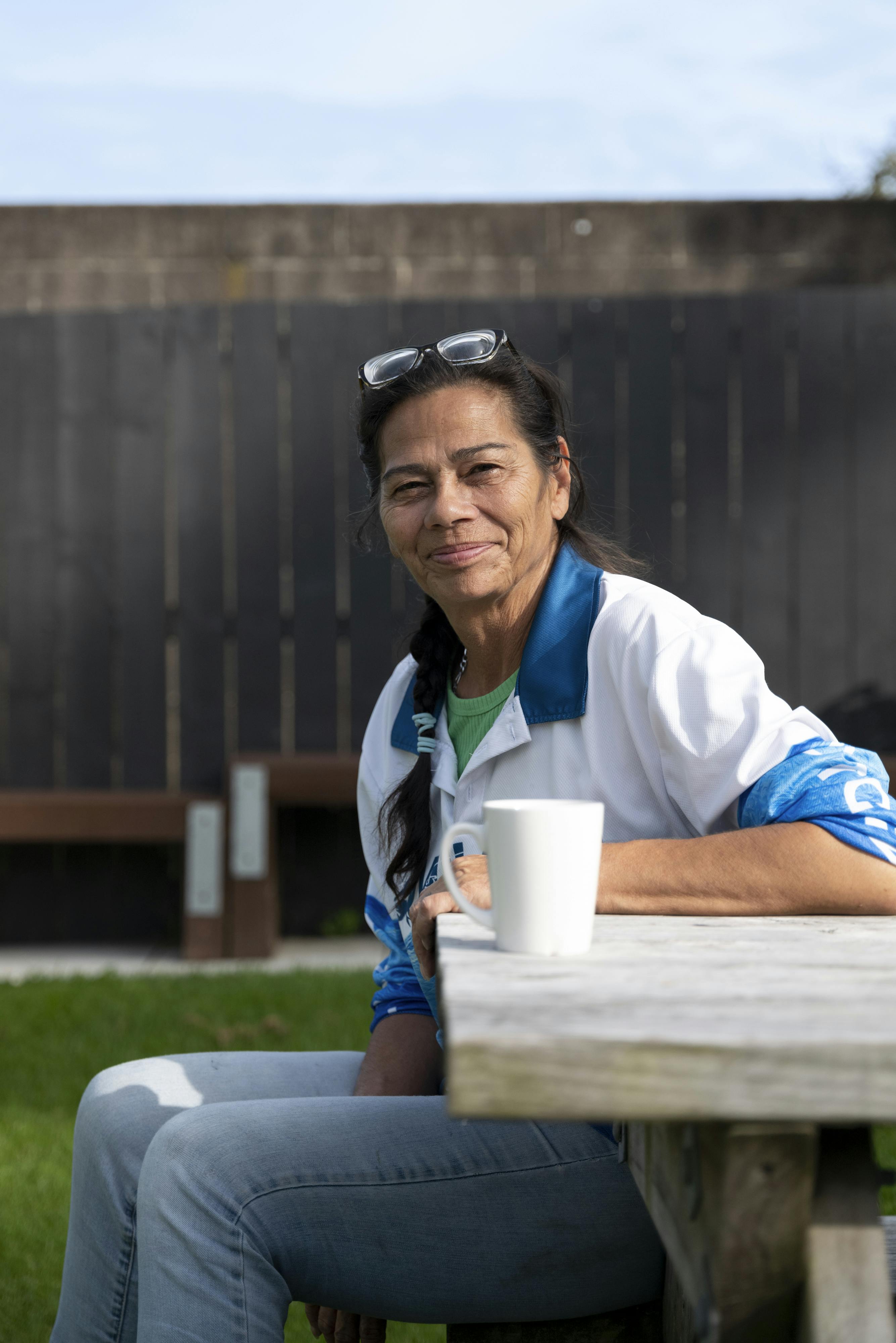 happy member outside in the community ground