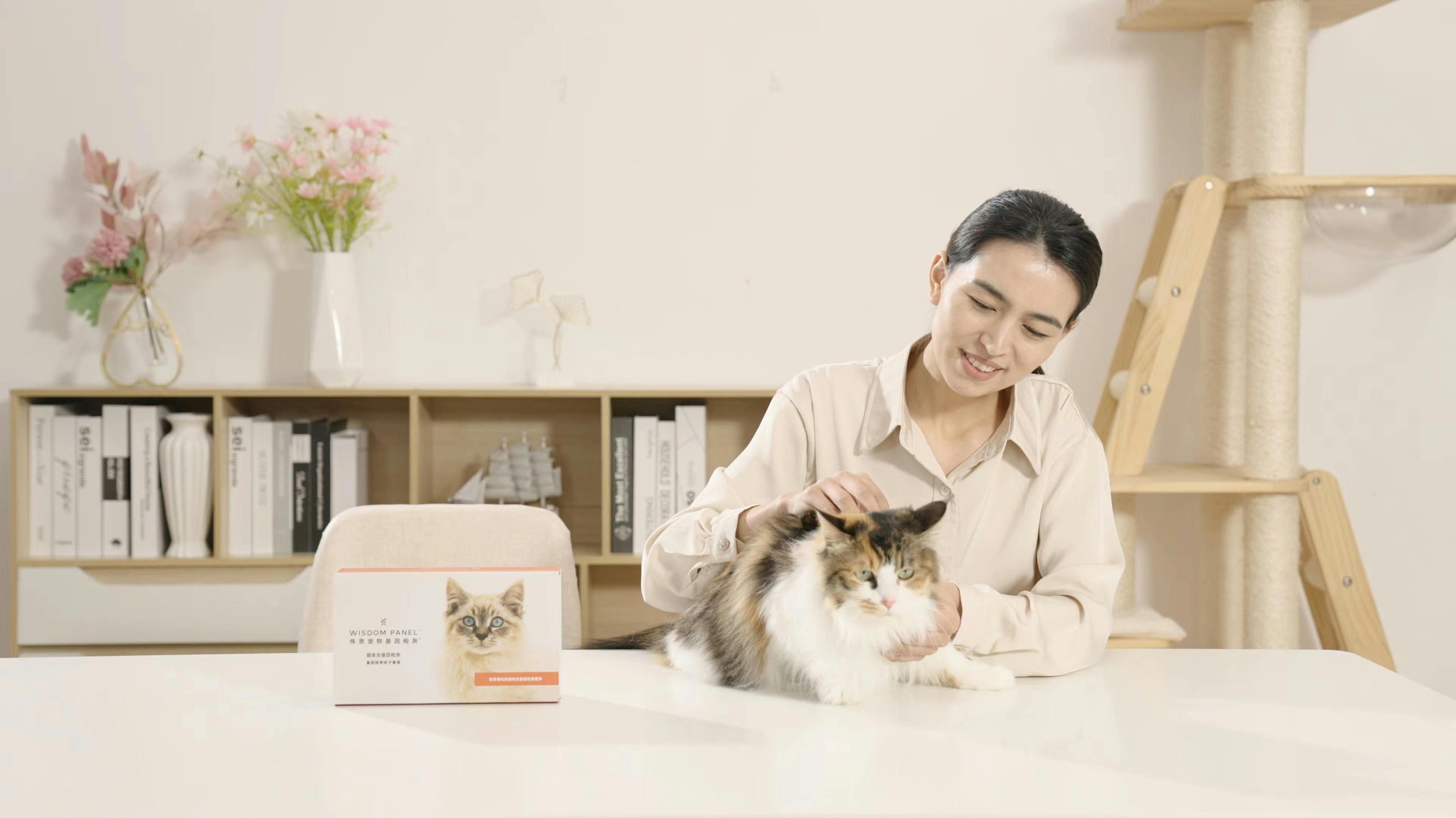 A lady and a cat with a Wisdom panel product
