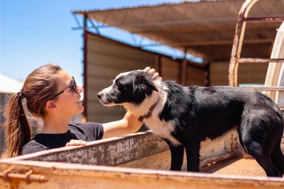 Woman bonding with her dog