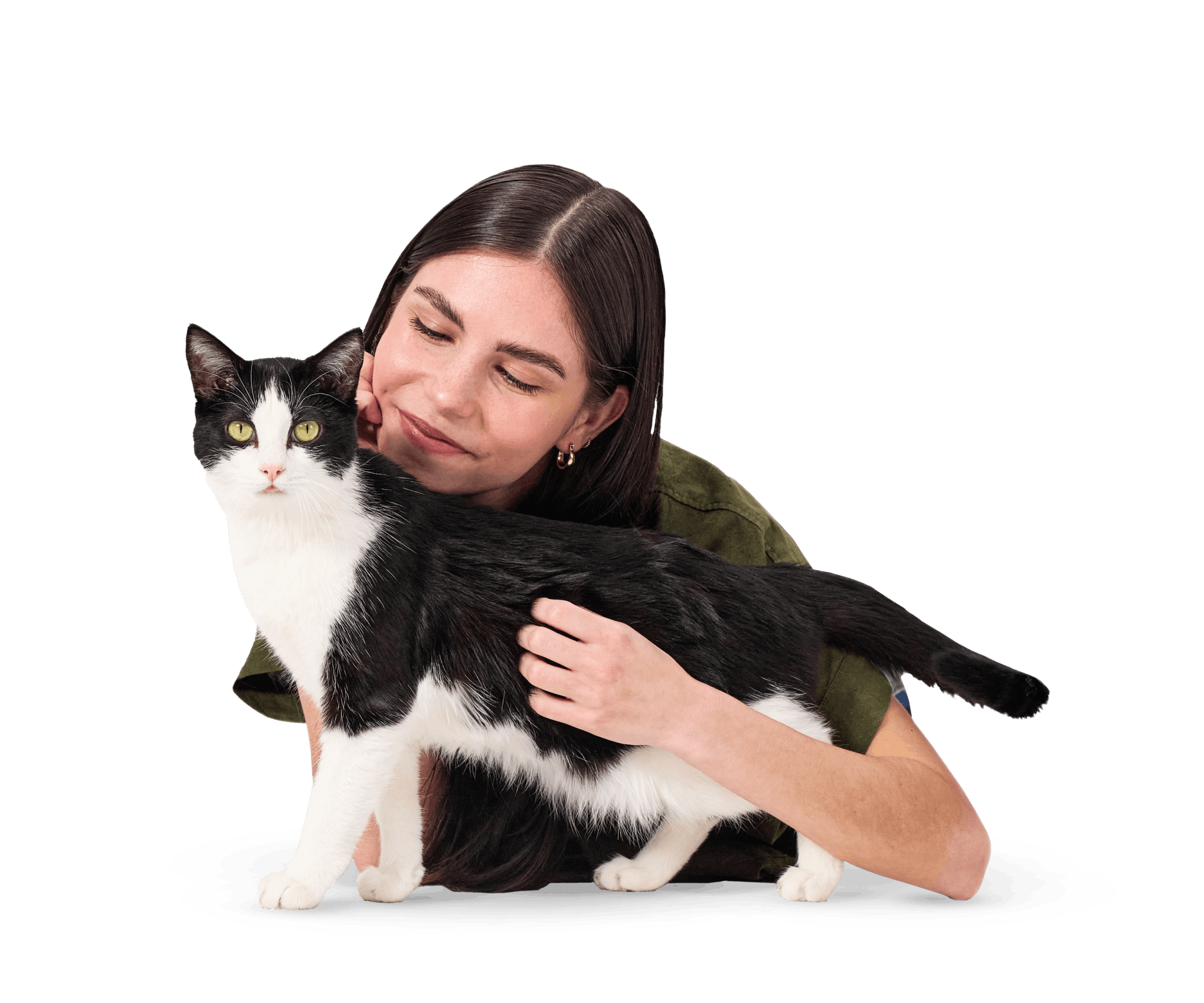 Woman smiling at black and white cat