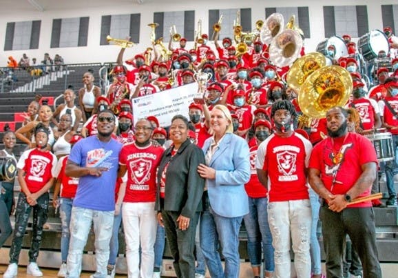Amy Witherite and 1-800-TruckWreck Awarded $10,000 to Jonesboro High School as part of the 2021 (Inaugural) 1-800-TruckWreck Great Atlanta High School Band Challenge. 