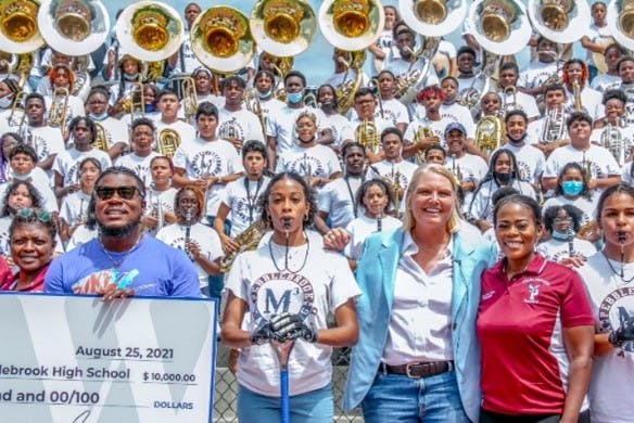 Amy Witherite and 1-800-TruckWreck awarded $10,000 to Pebblebrook High School as part of the 2021 (Inaugural) 1-800-TruckWreck Great Atlanta High School Band Challenge