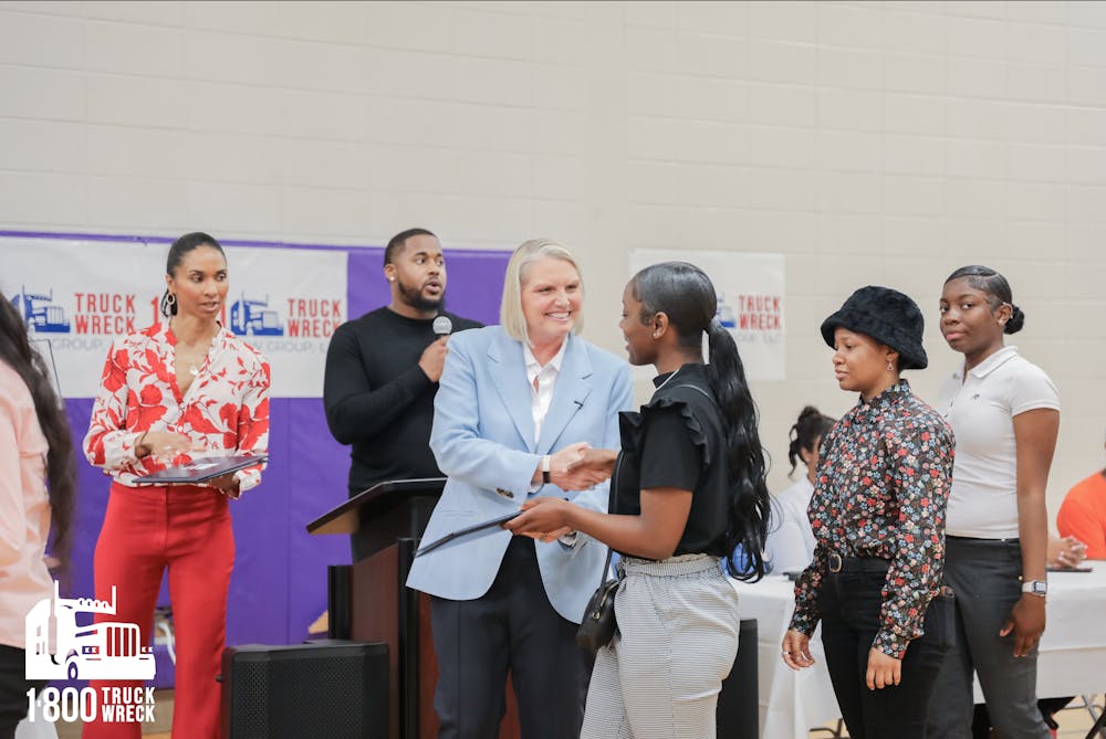 South Atlanta H.S. students receive $275,000 in college scholarships from Amy Witherite and 1-800 Truck Wreck