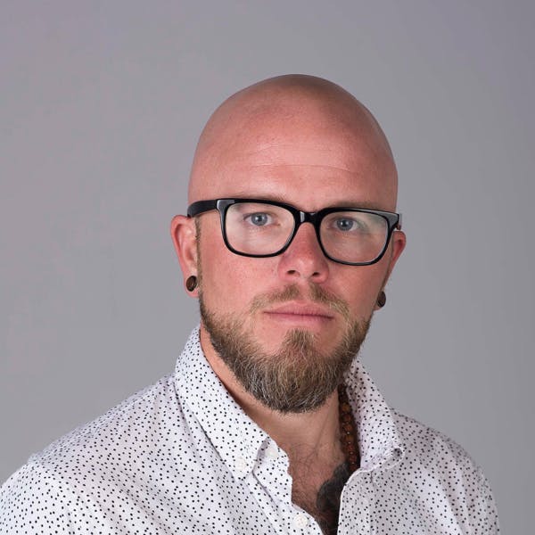 Headshot of Ryan