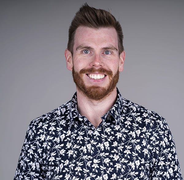 Headshot of Adam