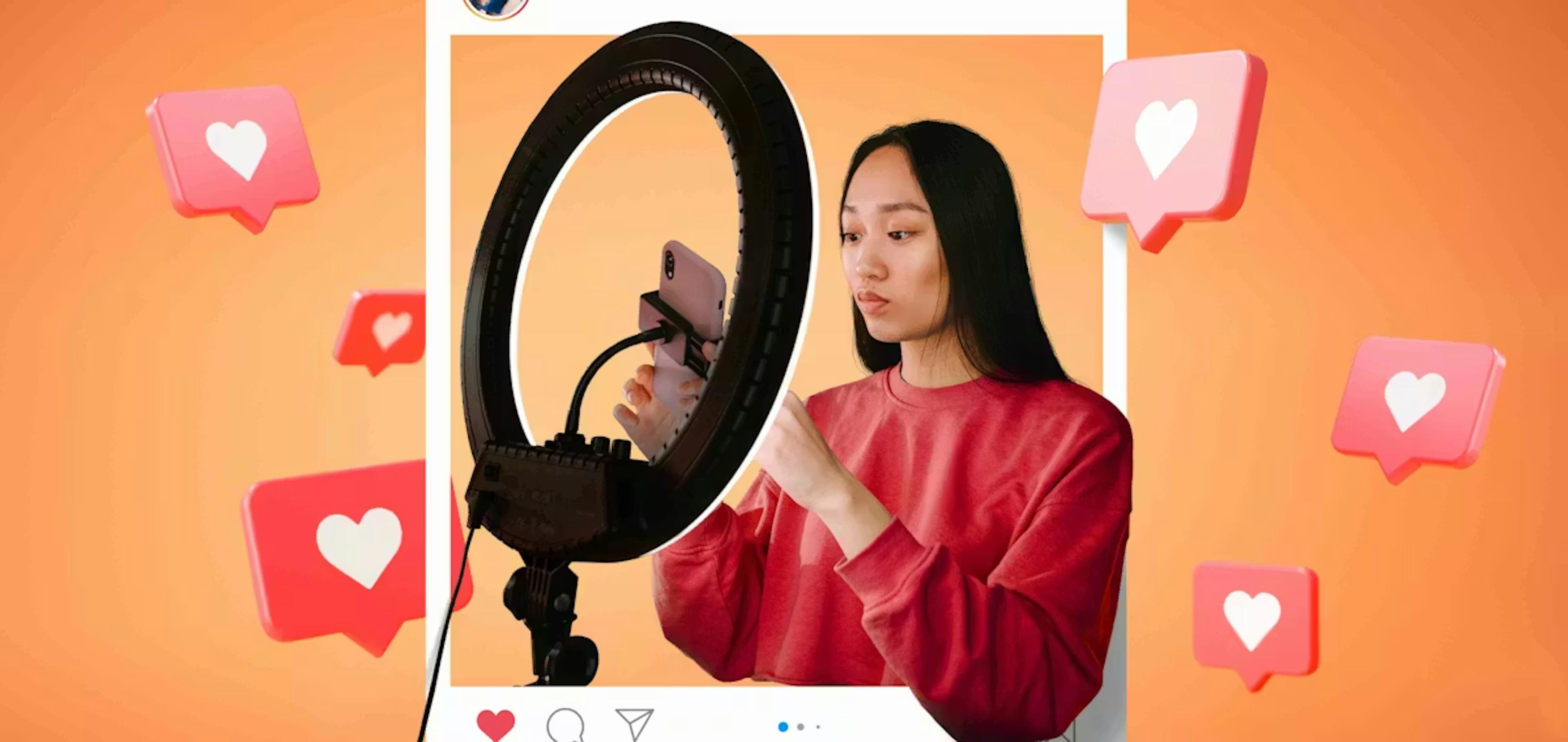 A young woman uses a ring light and smartphone to film vertical video content. This setup is ideal for creators who turn long-form into short-form video, transforming detailed YouTube videos into snappy TikToks or Instagram Reels.