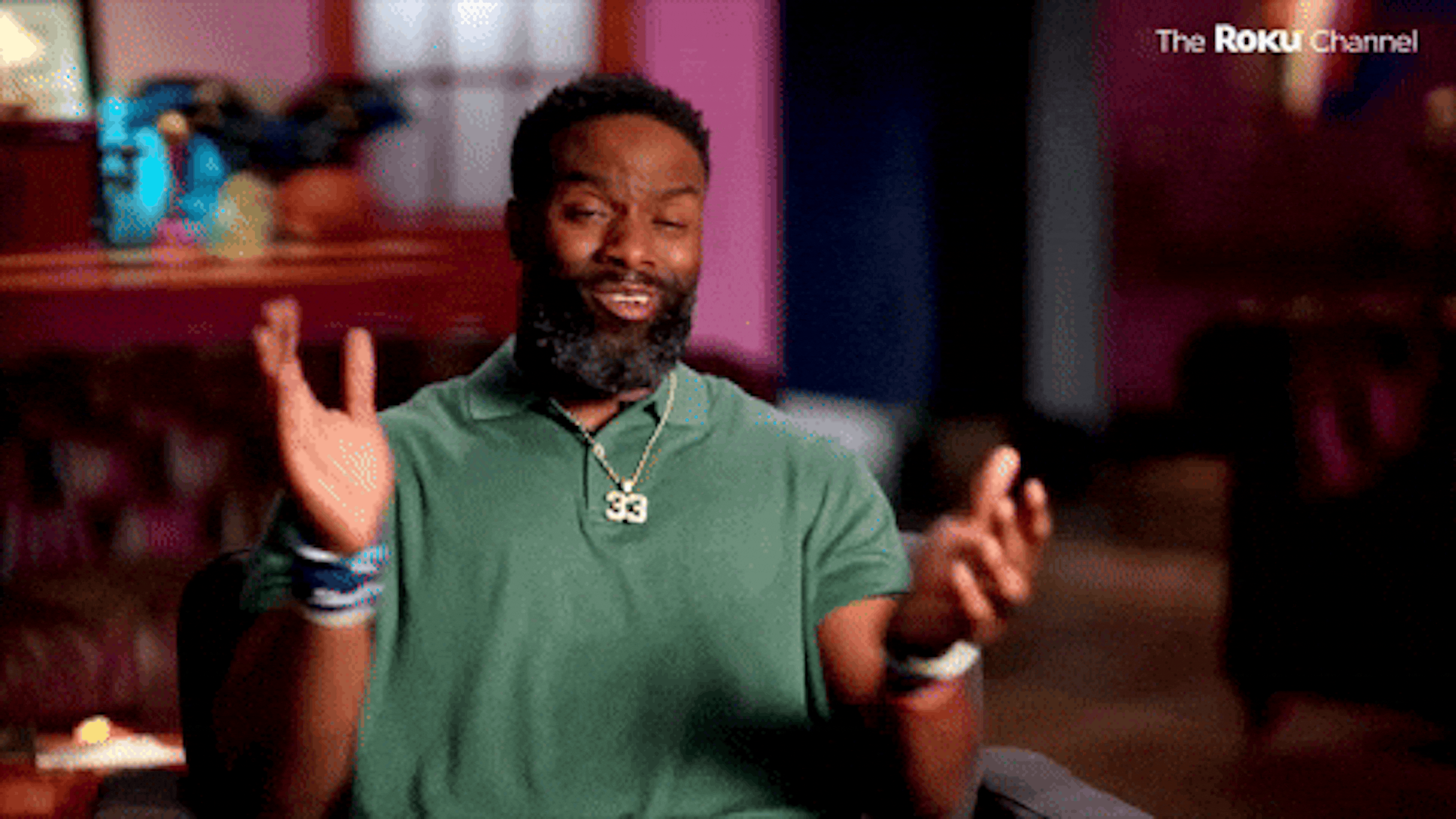 A man gesturing enthusiastically while explaining a complex topic, like the nuanced workflow differences between Submagic vs. Captions.ai vs. CapCut.