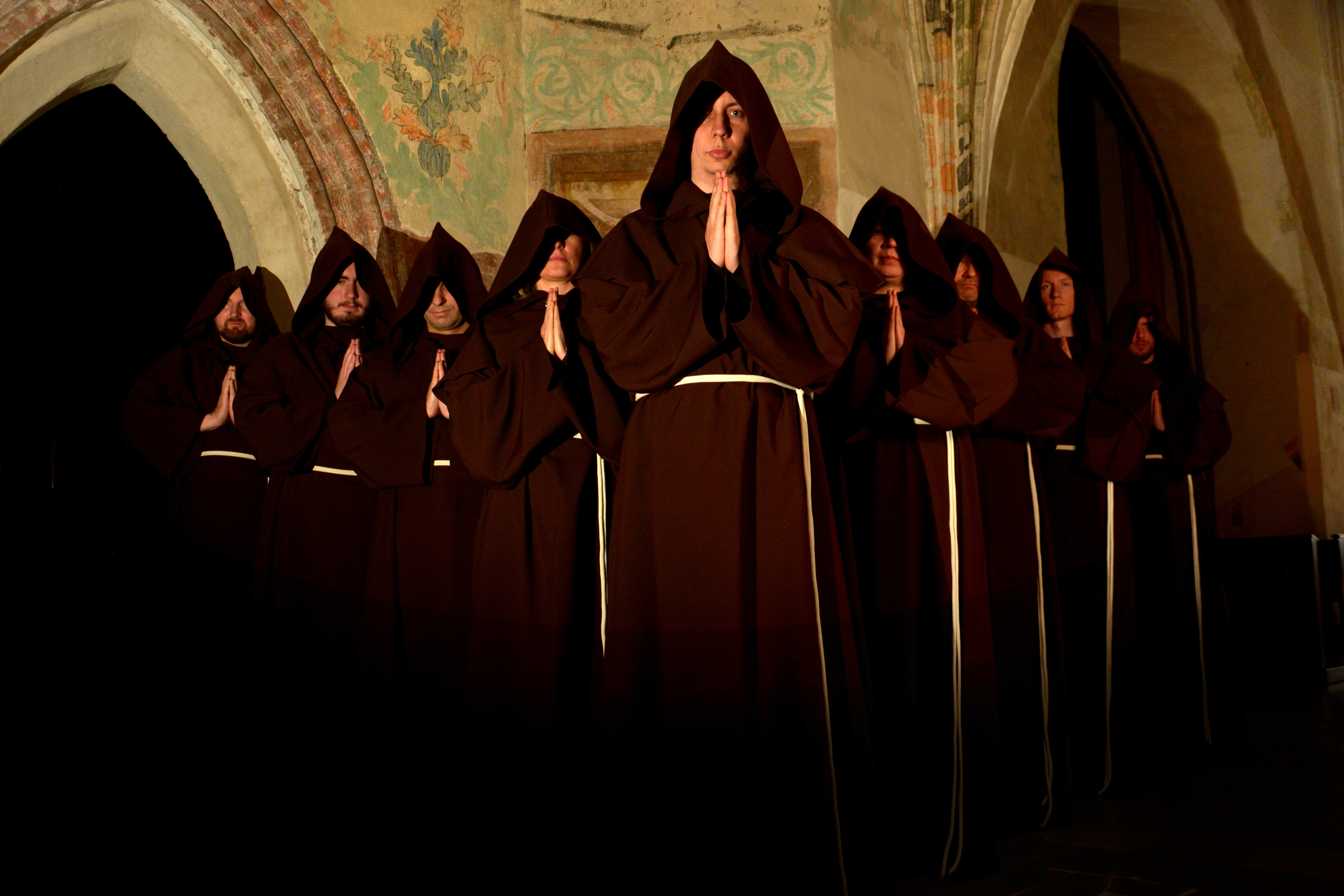 Koorrepetities in de bogengang