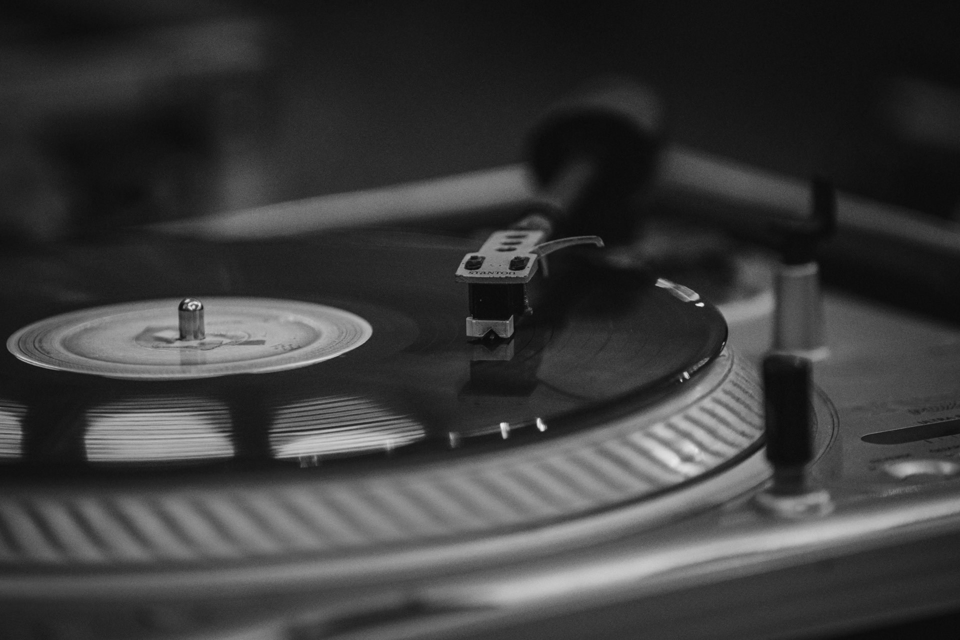 A vinyl record being played on a record player