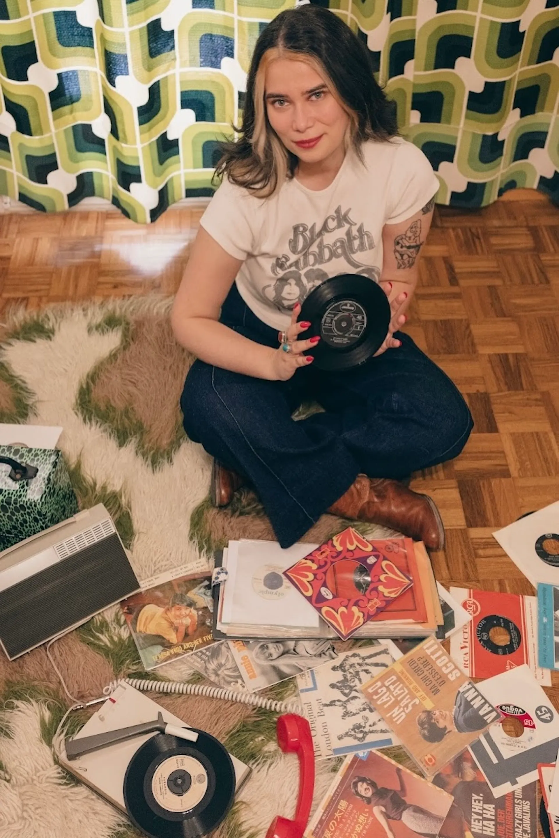 Zoe Agapidou Portrait with 7" Records