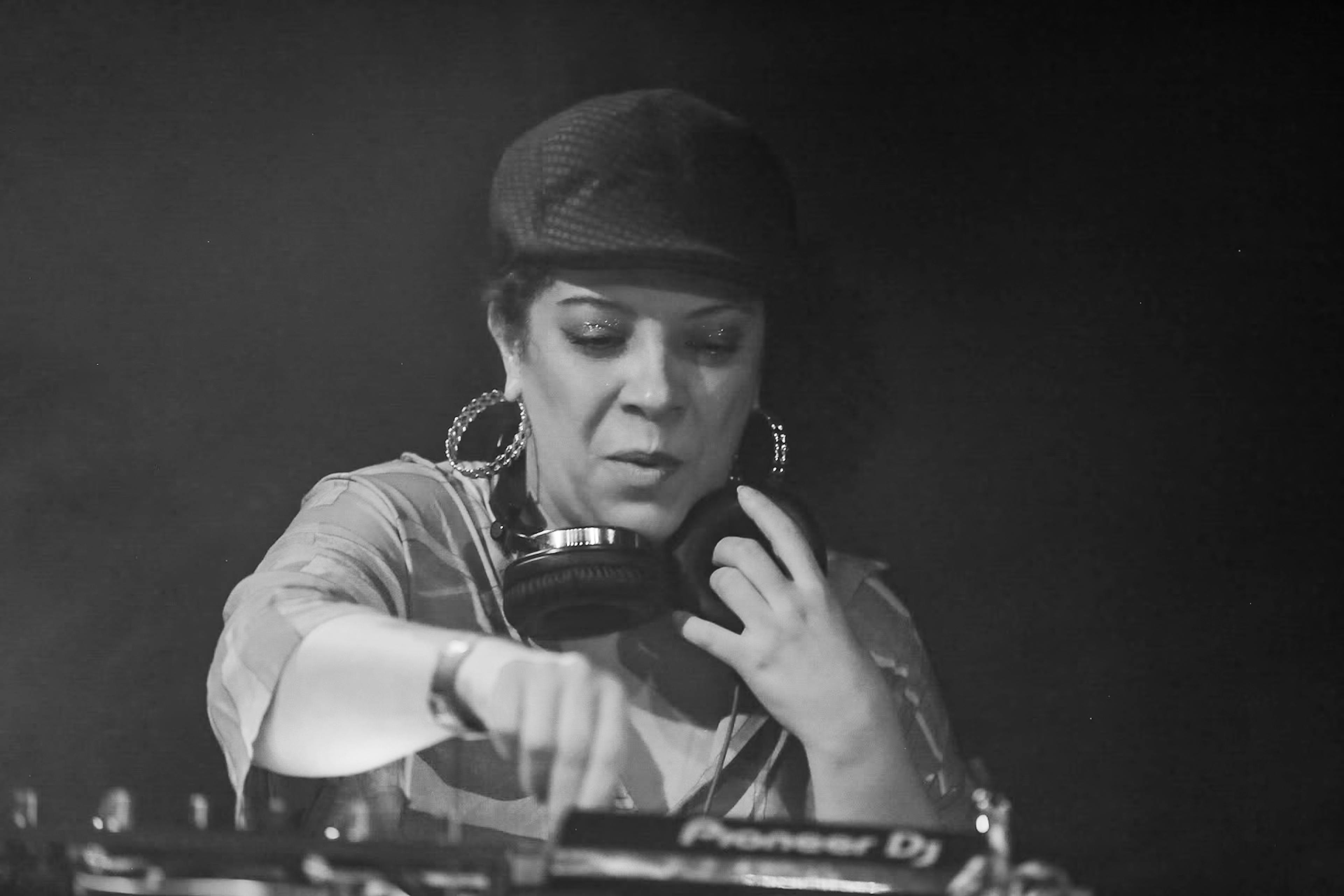 Daniella portrait DJing 