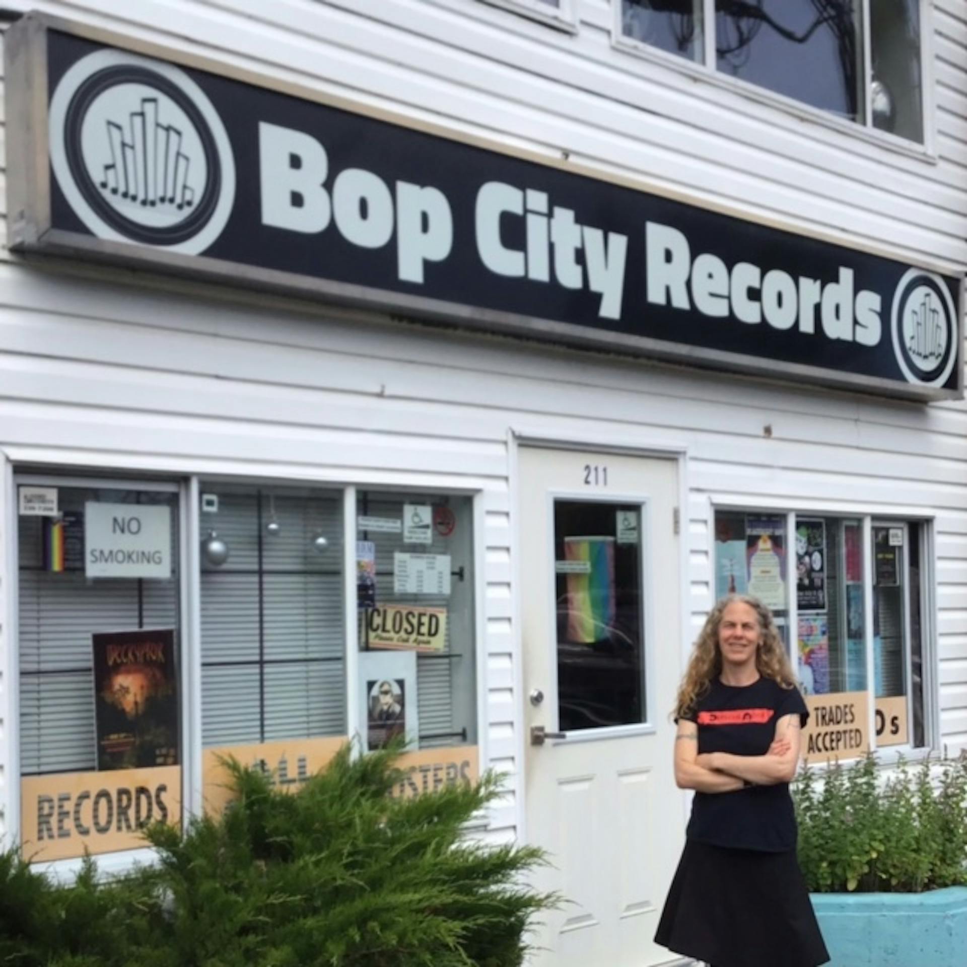 Karen standing in front of Bop City Records Sign