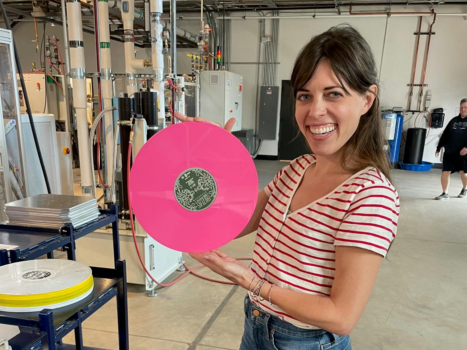Portrait of Brooke holding a pink record