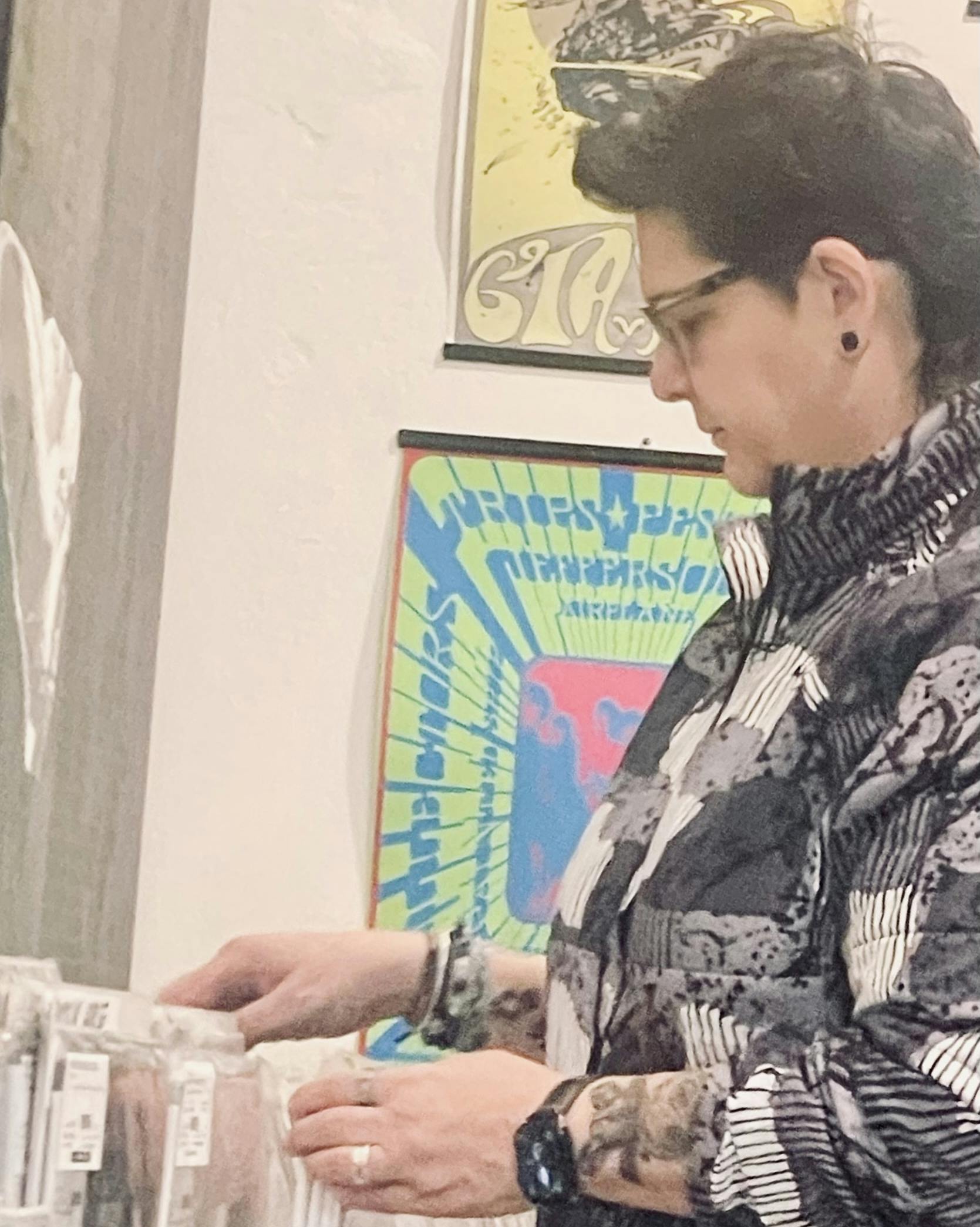 Heather Luciani Looking at Crates of Records