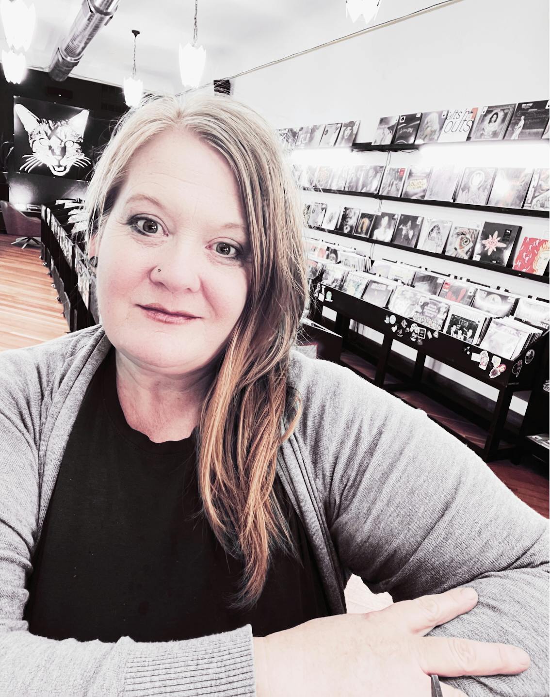 Portrait of Kelly at the record store