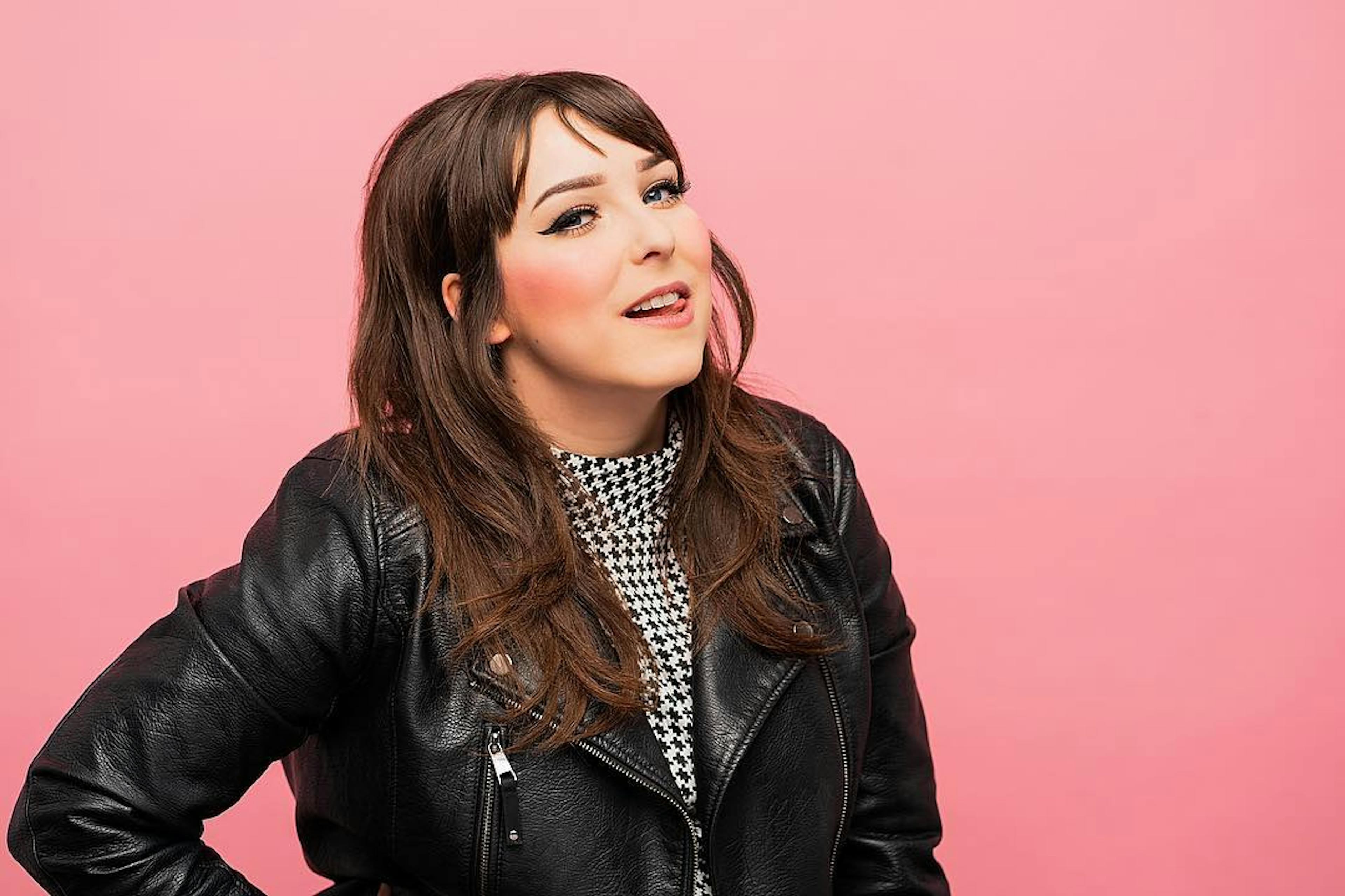 Portrait of DJ Blush with Pink Background