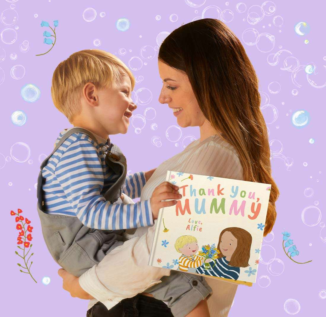 mum and child hugging with book