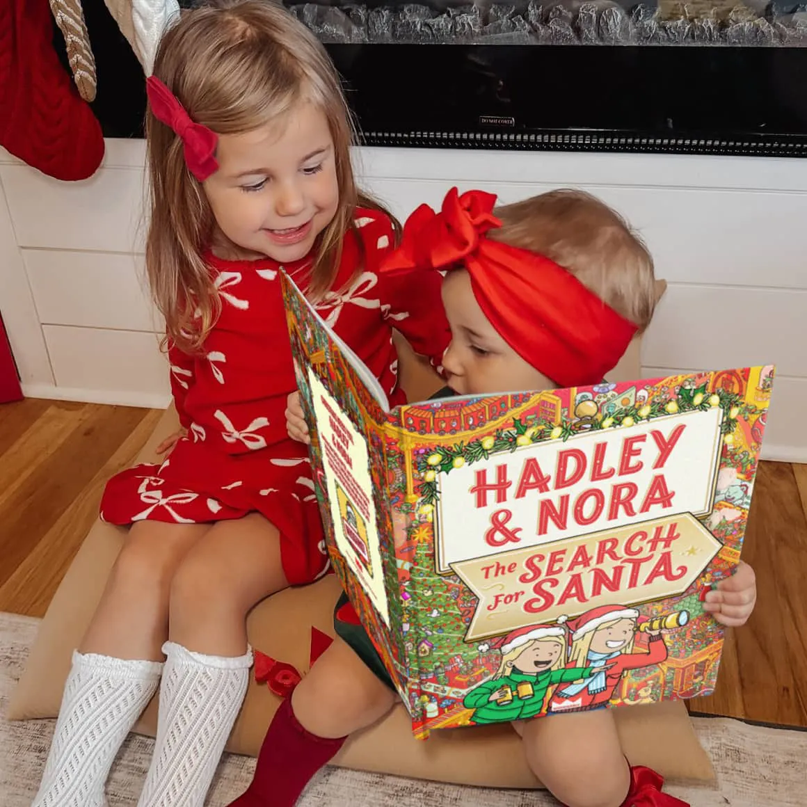 two kids reading book