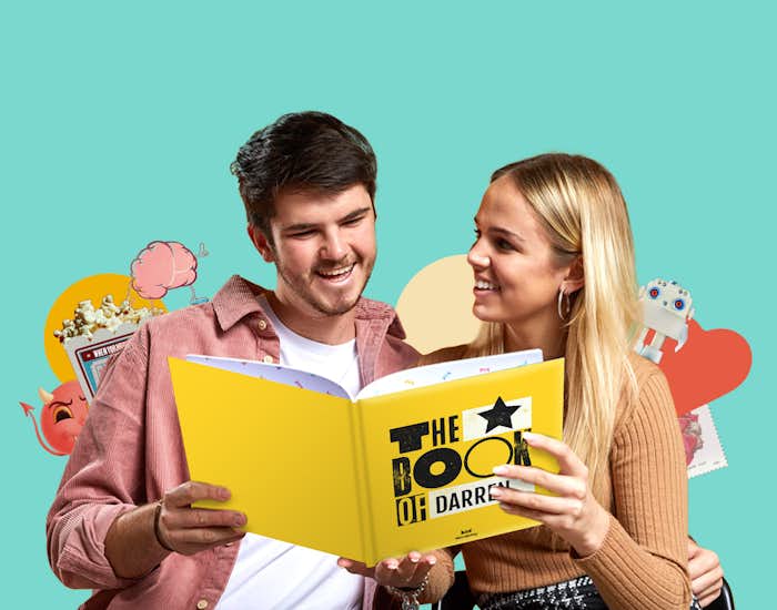 Man and woman reading personalised book