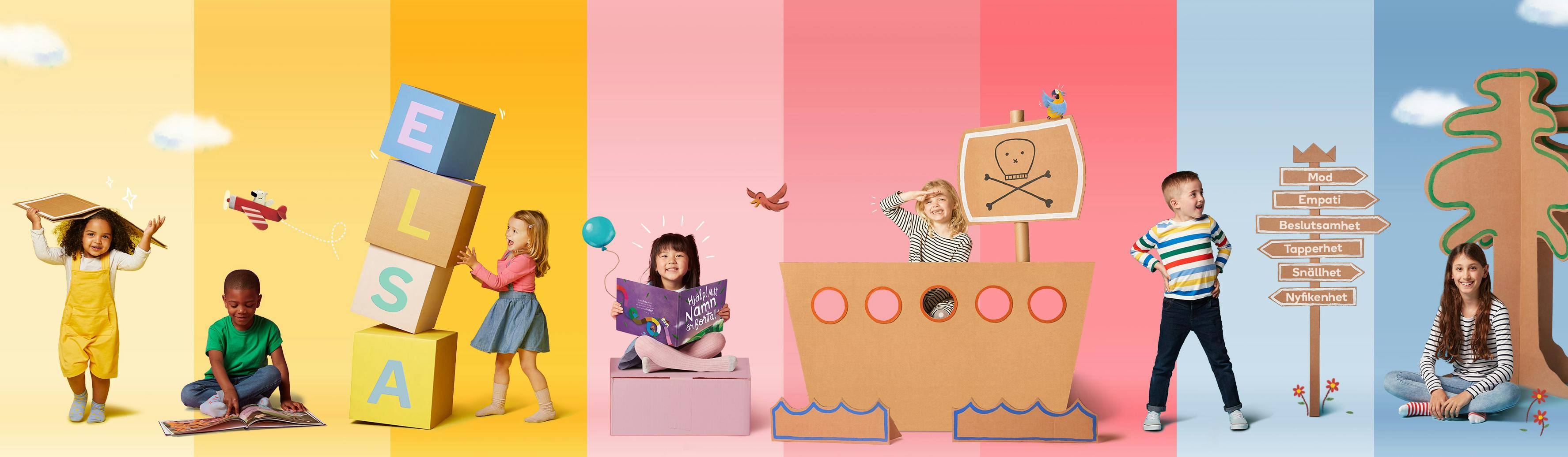 Barn med kartongböcker och bokstäver