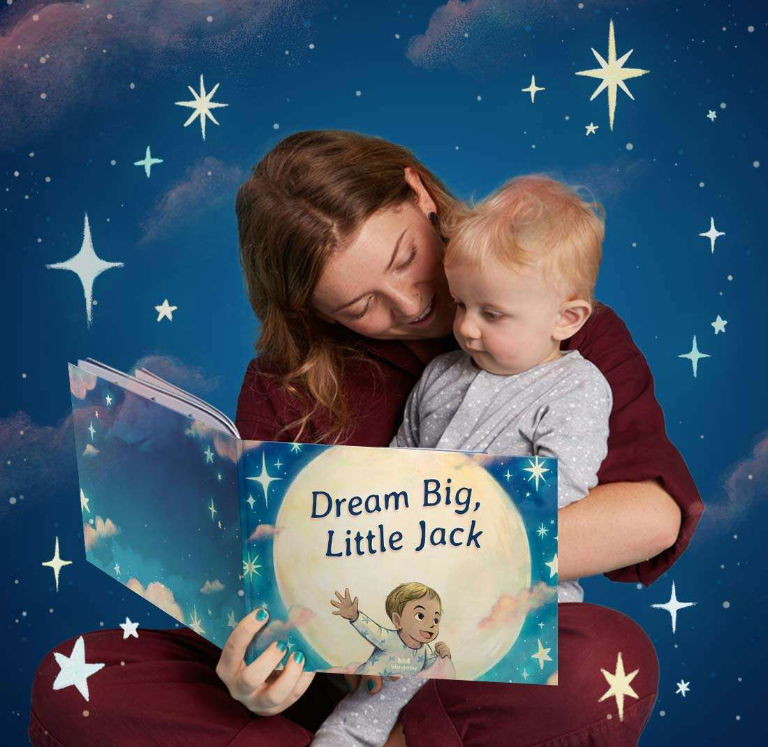 Mother and son reading Dream Big, Little One together