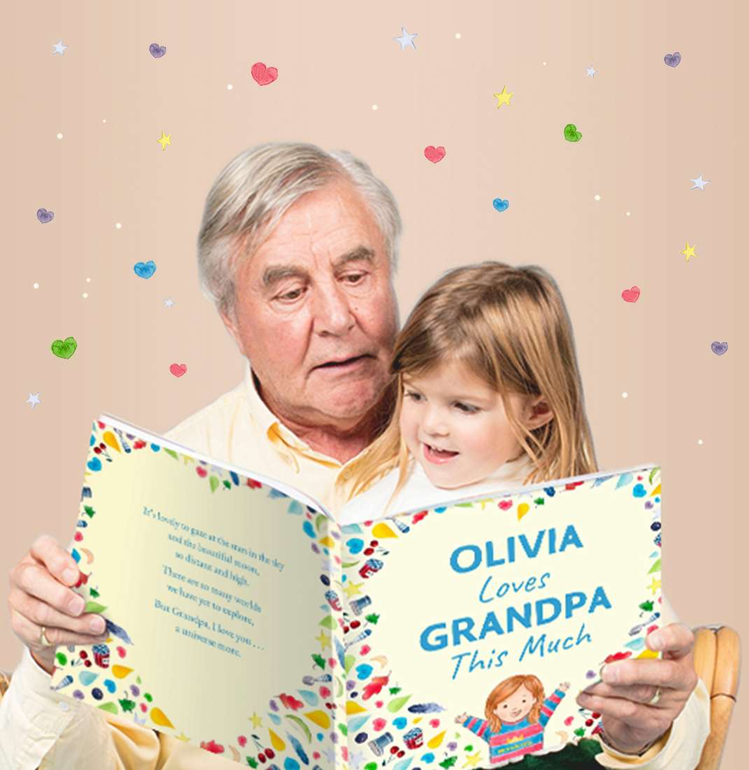 Grandad and granddaughter reading I Love Grandad This Much