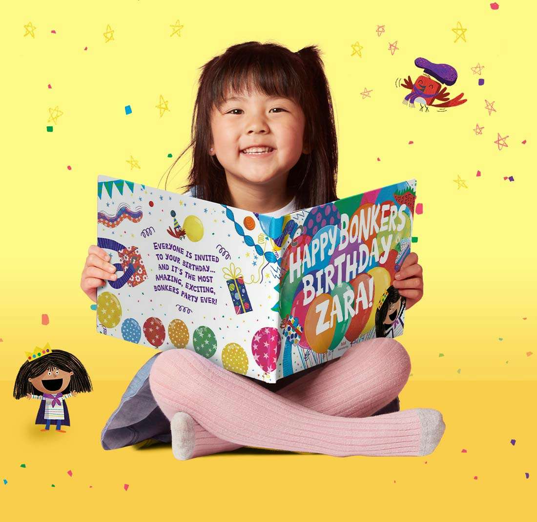 Little girl with her personalized copy of Happy Bonkers Birthday