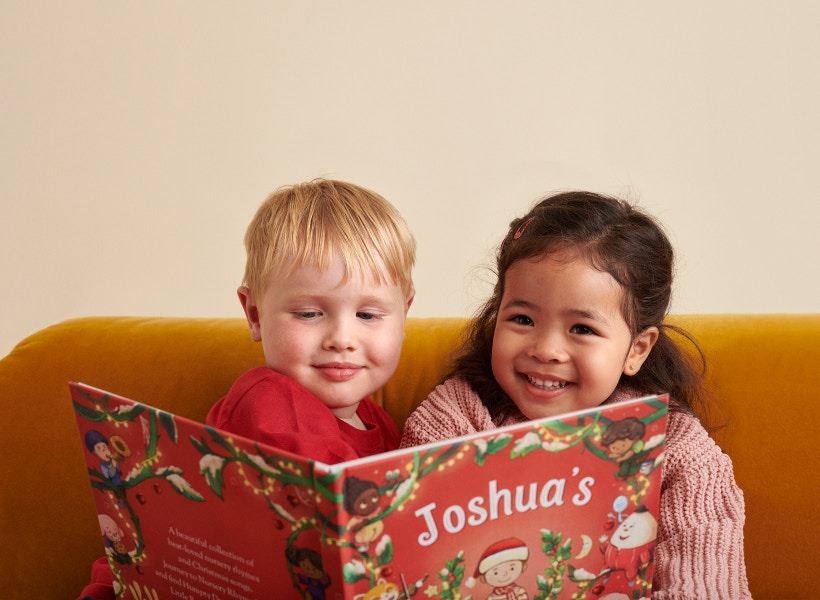 children reading Treasury of Nursery Rhymes