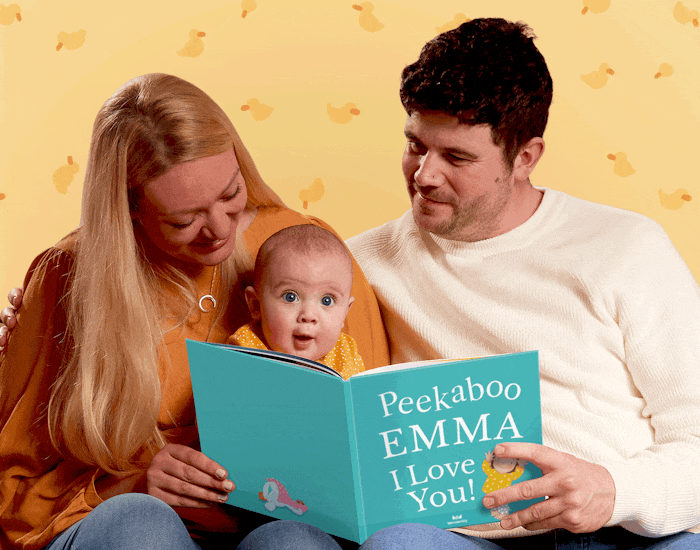 Parents and child reading Peekaboo, I Love You together