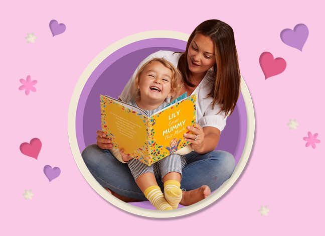 mum and child reading book and laughing