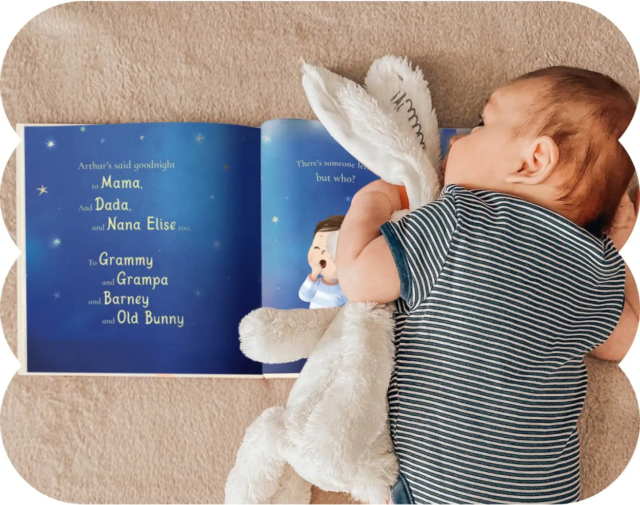 A baby asleep with their personalised book