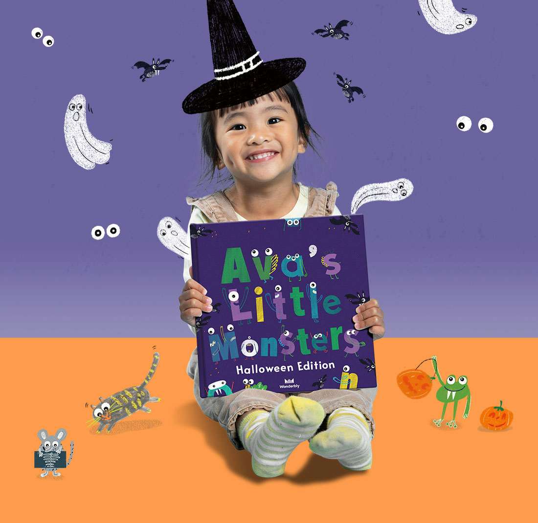 Little girl holding her copy of My Little Monsters (Halloween Edition)