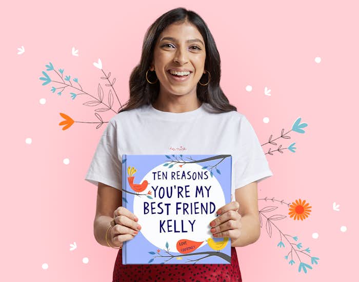 Woman holding her copy of Ten Reasons You're My Best Friend