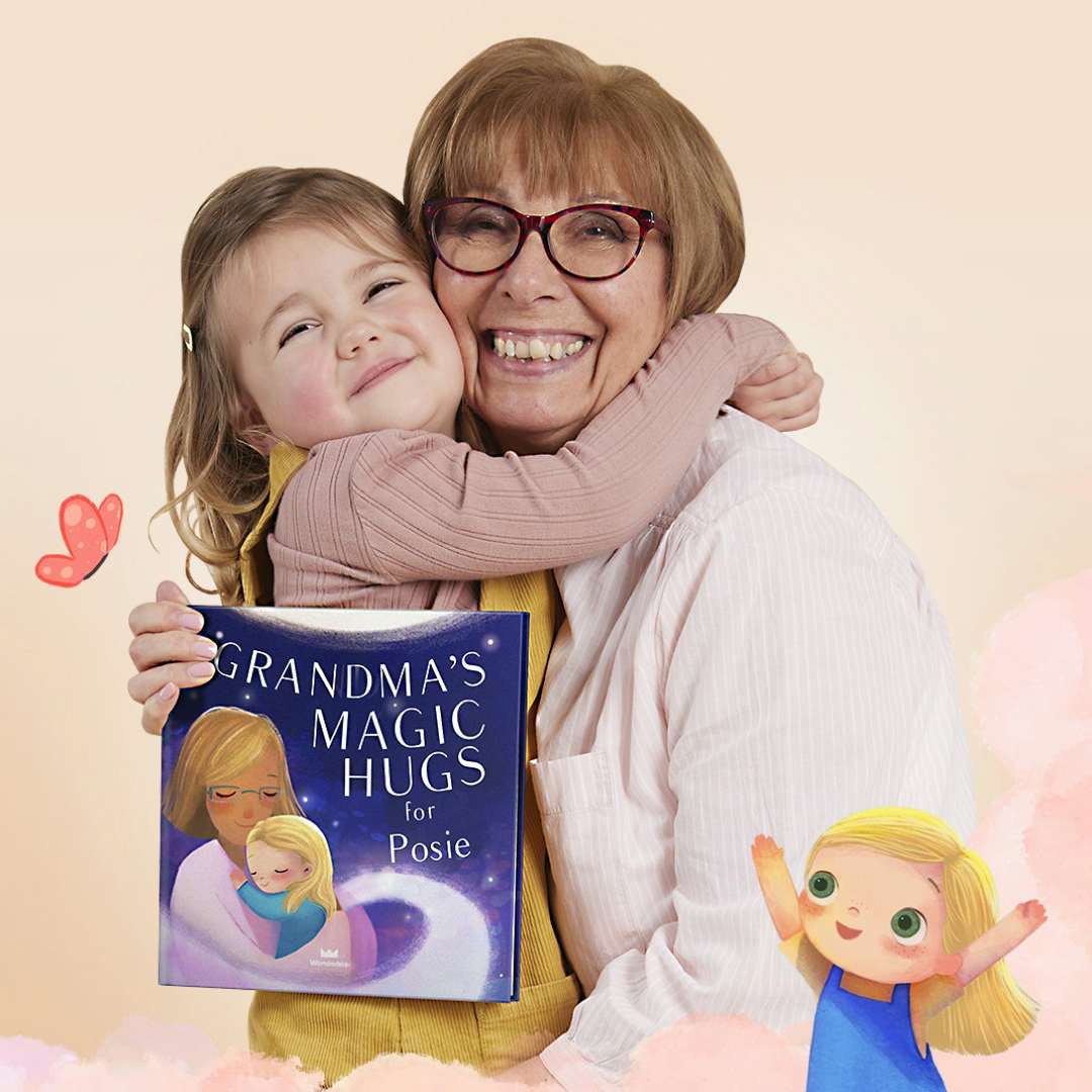 Mother hugging her child who is holding the book